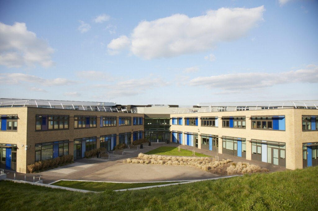 A photo of the outside of the Leigh Academy Longfield building